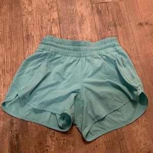 Lululemon Lined Tracker Shorts size 8 with 4” inseam.